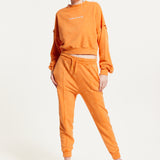 House of Holland Tracksuit Bottoms in Orange with a Drawstring Waist