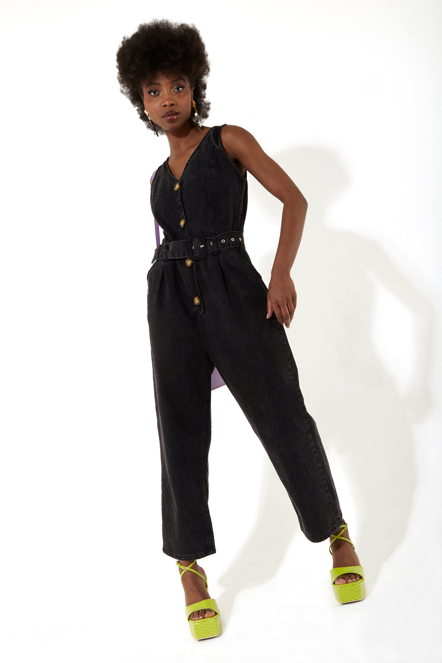 House of Holland black 90’s look denim jumpsuit with a belt and tortoise shell buttons