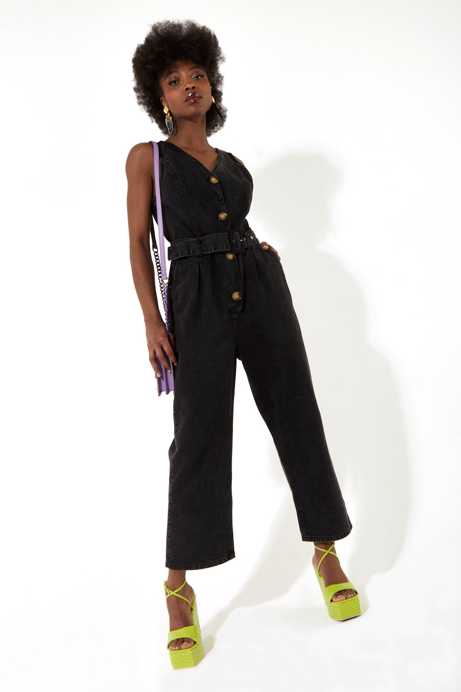 House of Holland black 90’s look denim jumpsuit with a belt and tortoise shell buttons