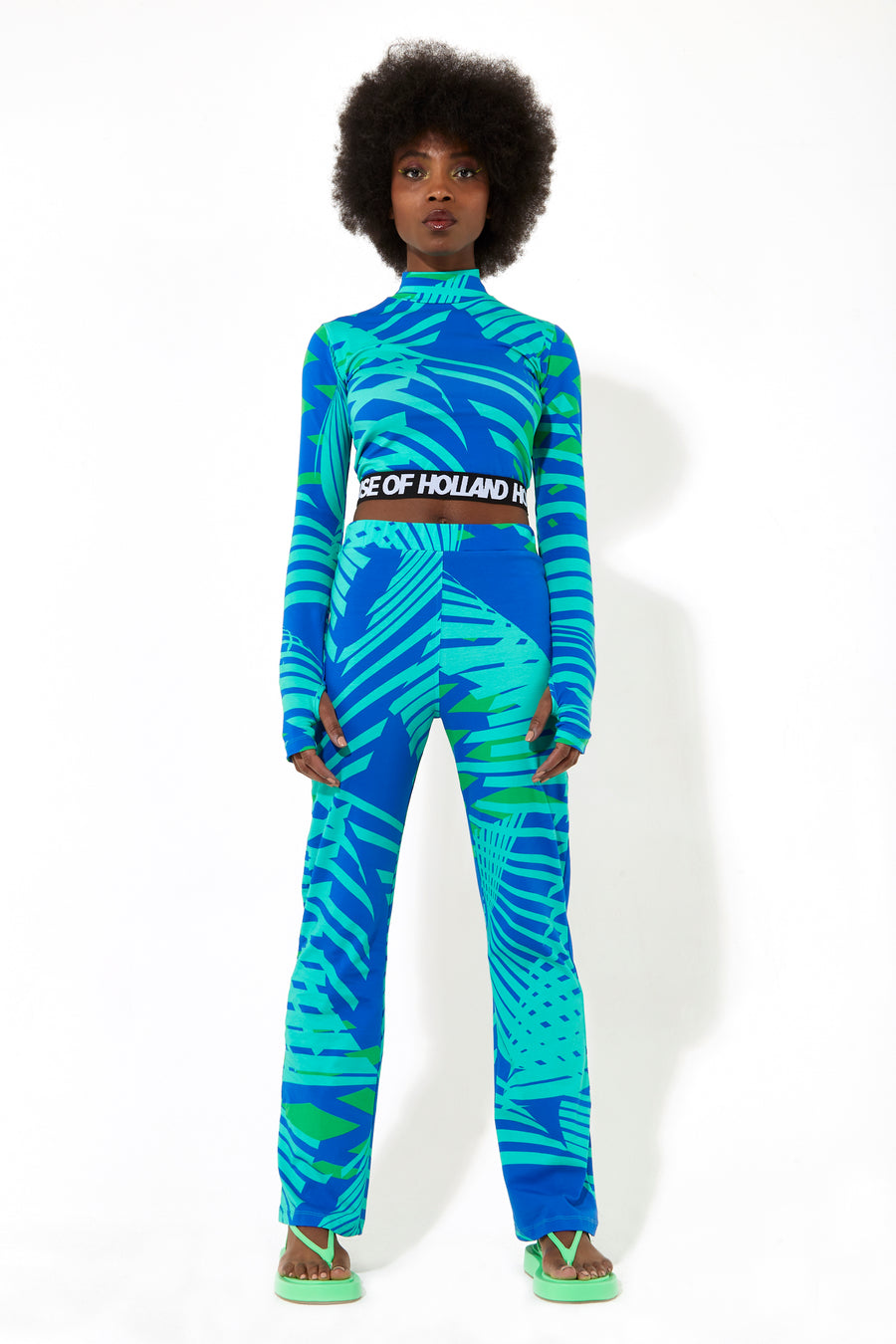 House of Holland jersey high neck top with a tropical print elasticated logo waistband and thumb hole details