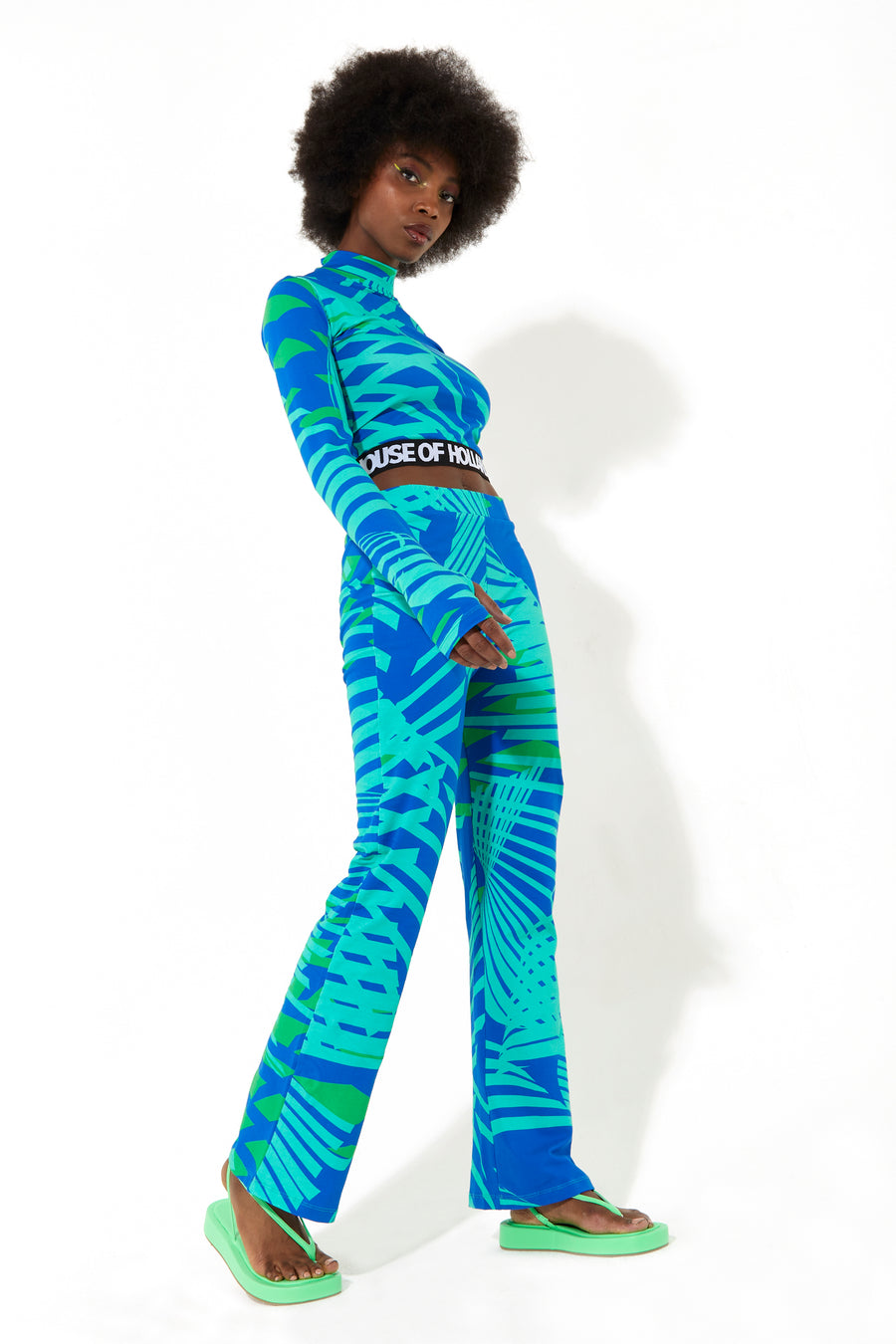 House of Holland jersey high neck top with a tropical print elasticated logo waistband and thumb hole details