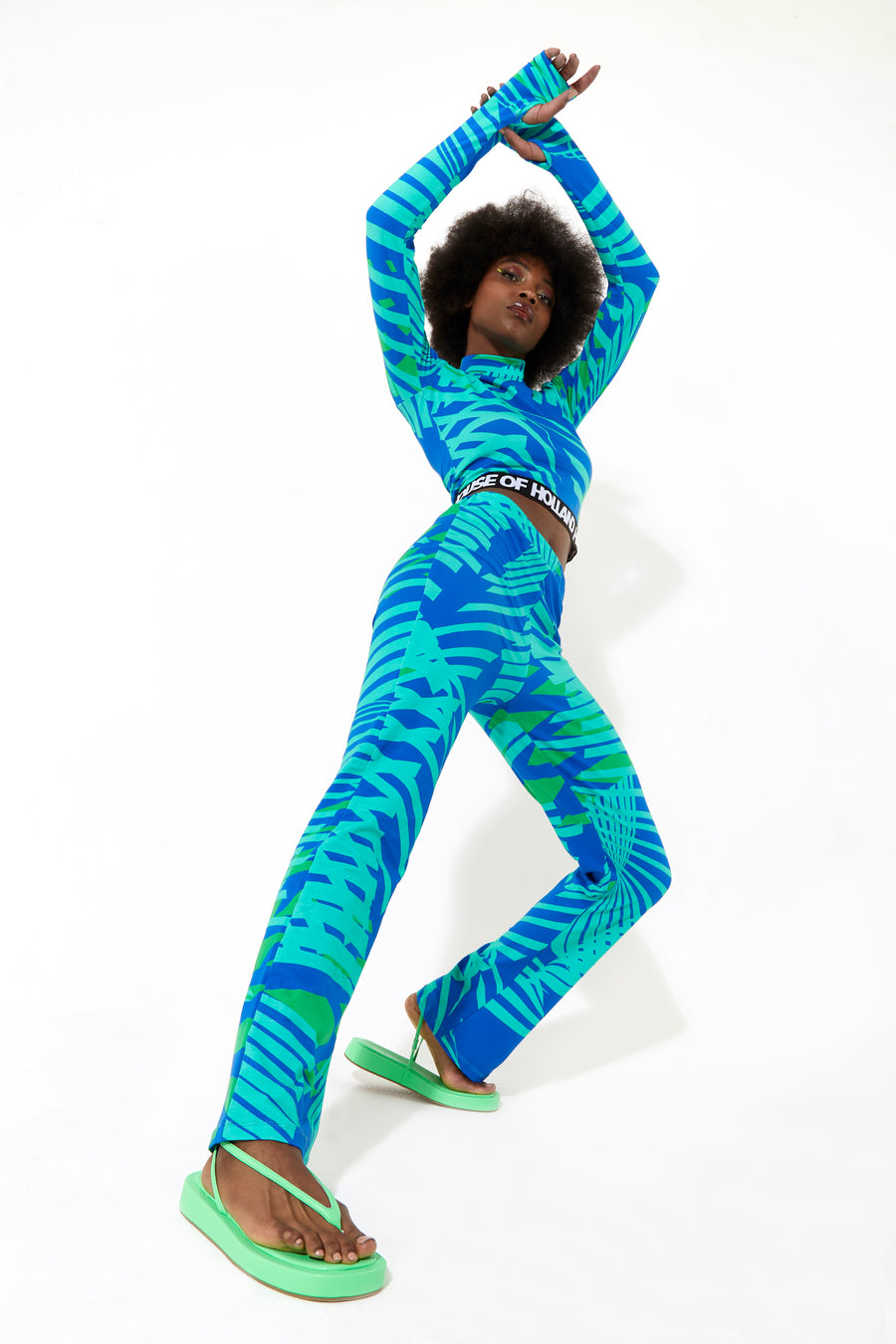 House of Holland jersey high neck top with a tropical print elasticated logo waistband and thumb hole details