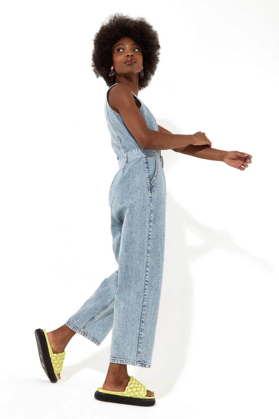 House of Holland blue 90’s look denim jumpsuit with a belt and tortoise shell buttons
