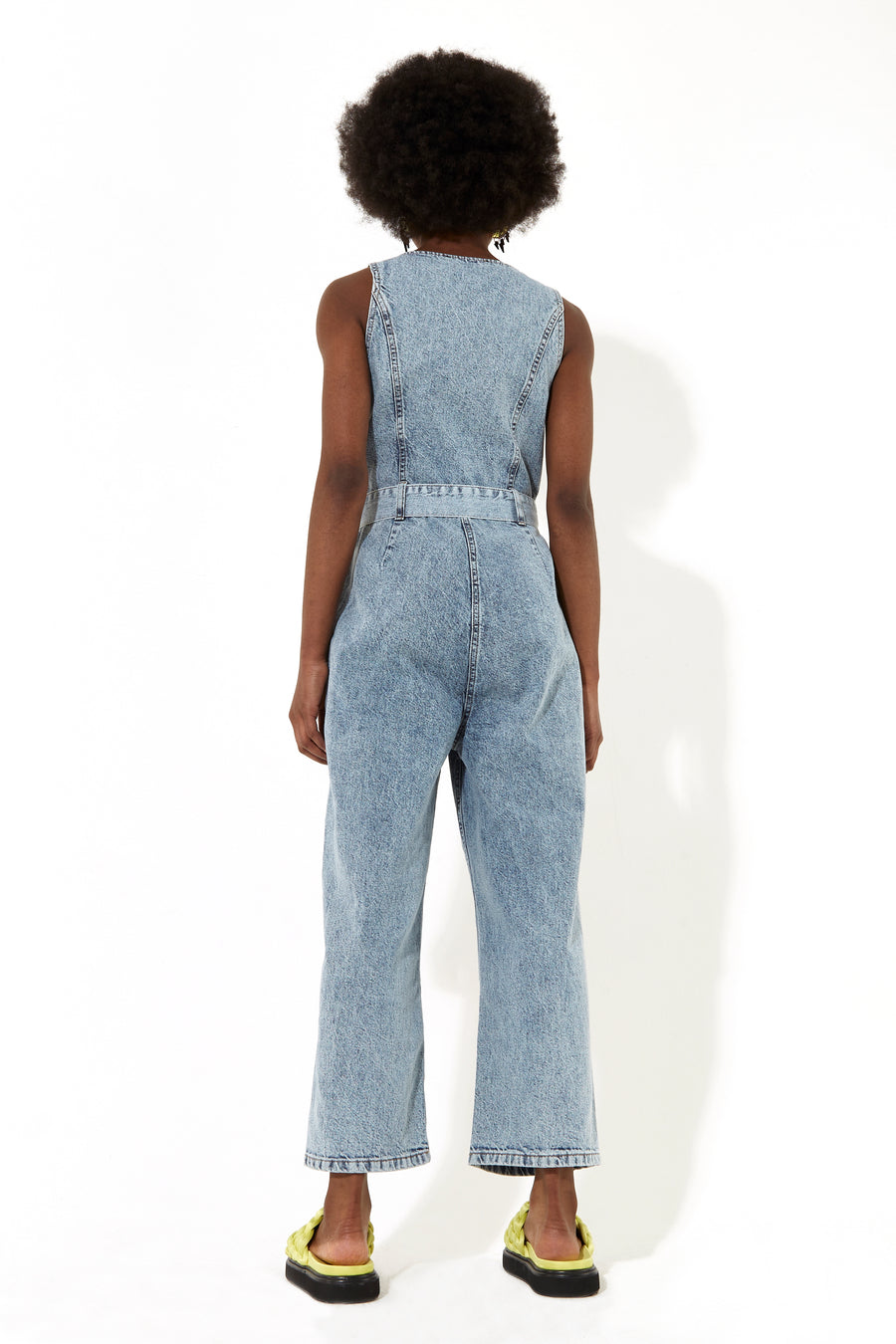 House of Holland blue 90’s look denim jumpsuit with a belt and tortoise shell buttons