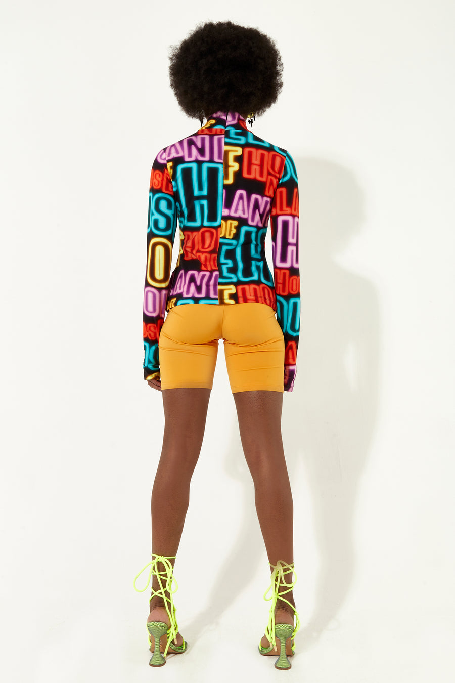 House of Holland High neck multi colour neon light print jersey top with thumb holes and a key hole cut out