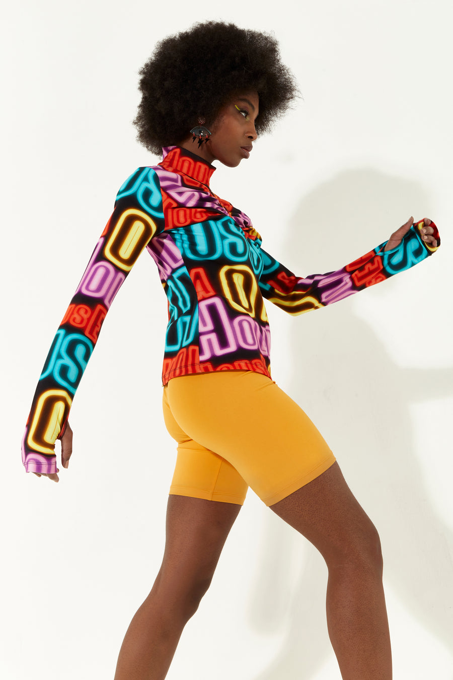 House of Holland High neck multi colour neon light print jersey top with thumb holes and a key hole cut out